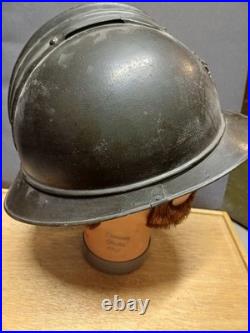 Beau casque Adrian modèle 1915 de l'Infanterie WW1 coiffe cuir du 1er type